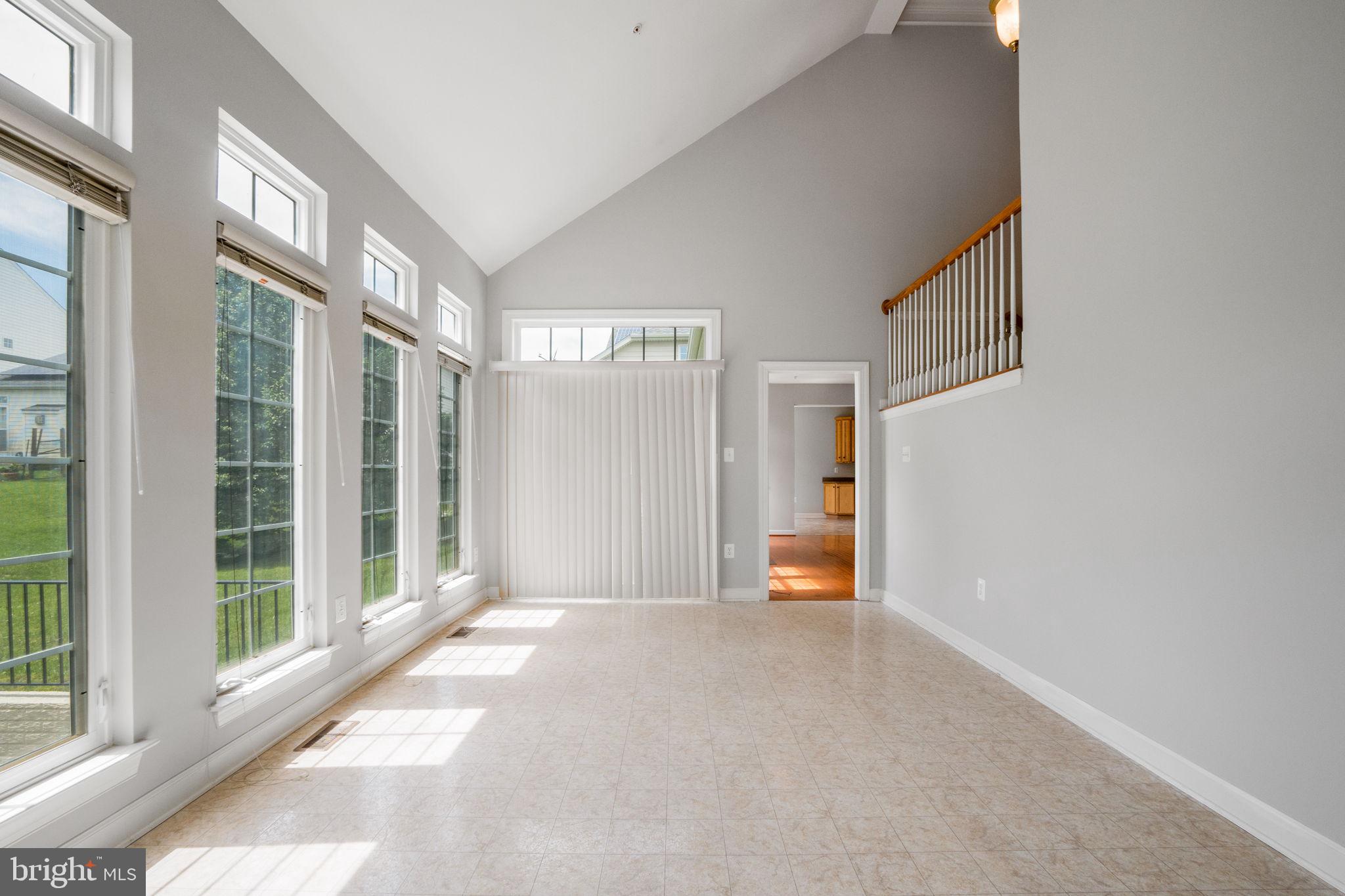 14108 Chivas Circle Laurel, MD 20707 - Photo 16 of 51 a view of an empty room with large windows