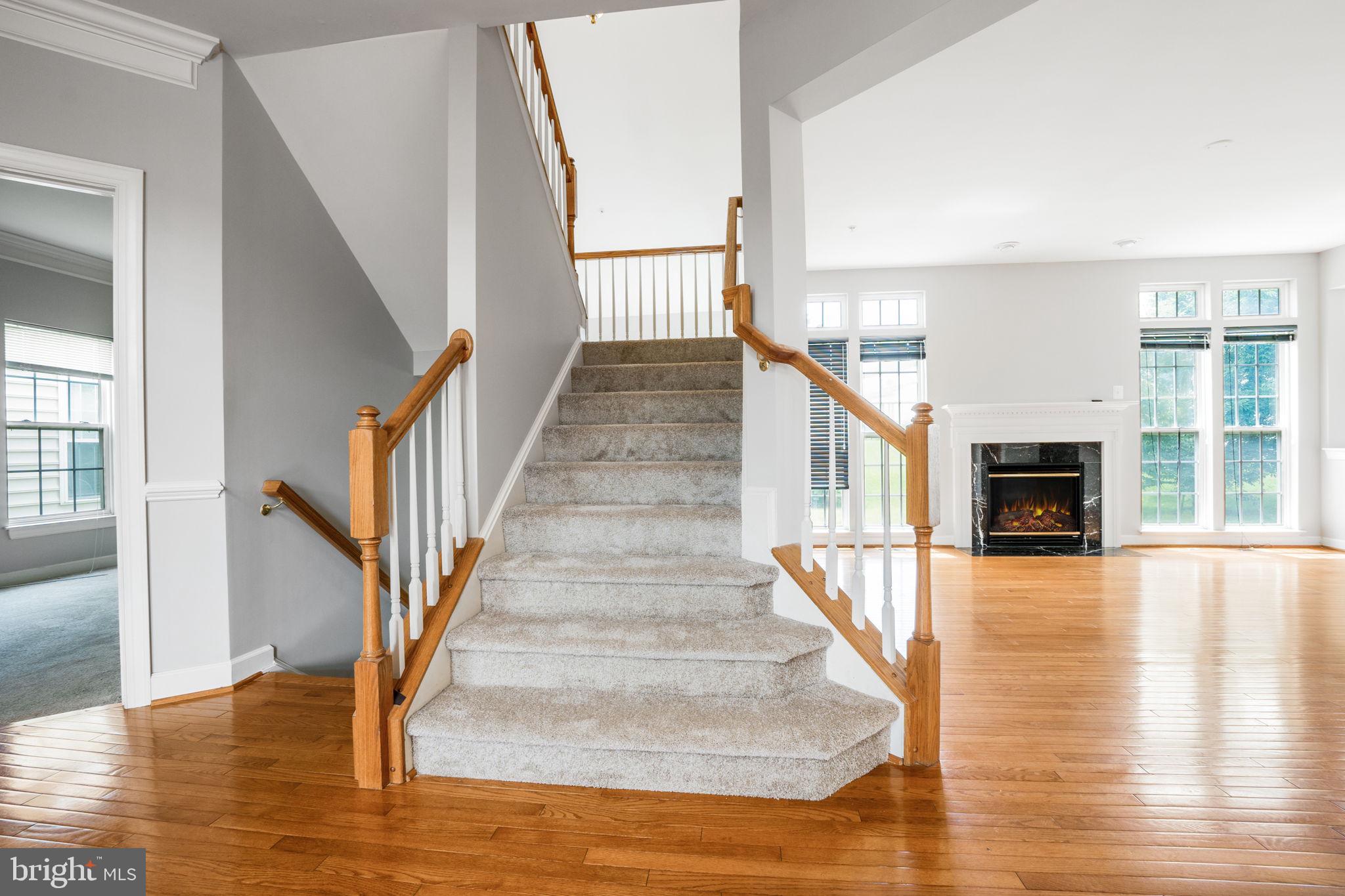14108 Chivas Circle Laurel, MD 20707 - Photo 19 of 51 a view of staircase with white walls and windows