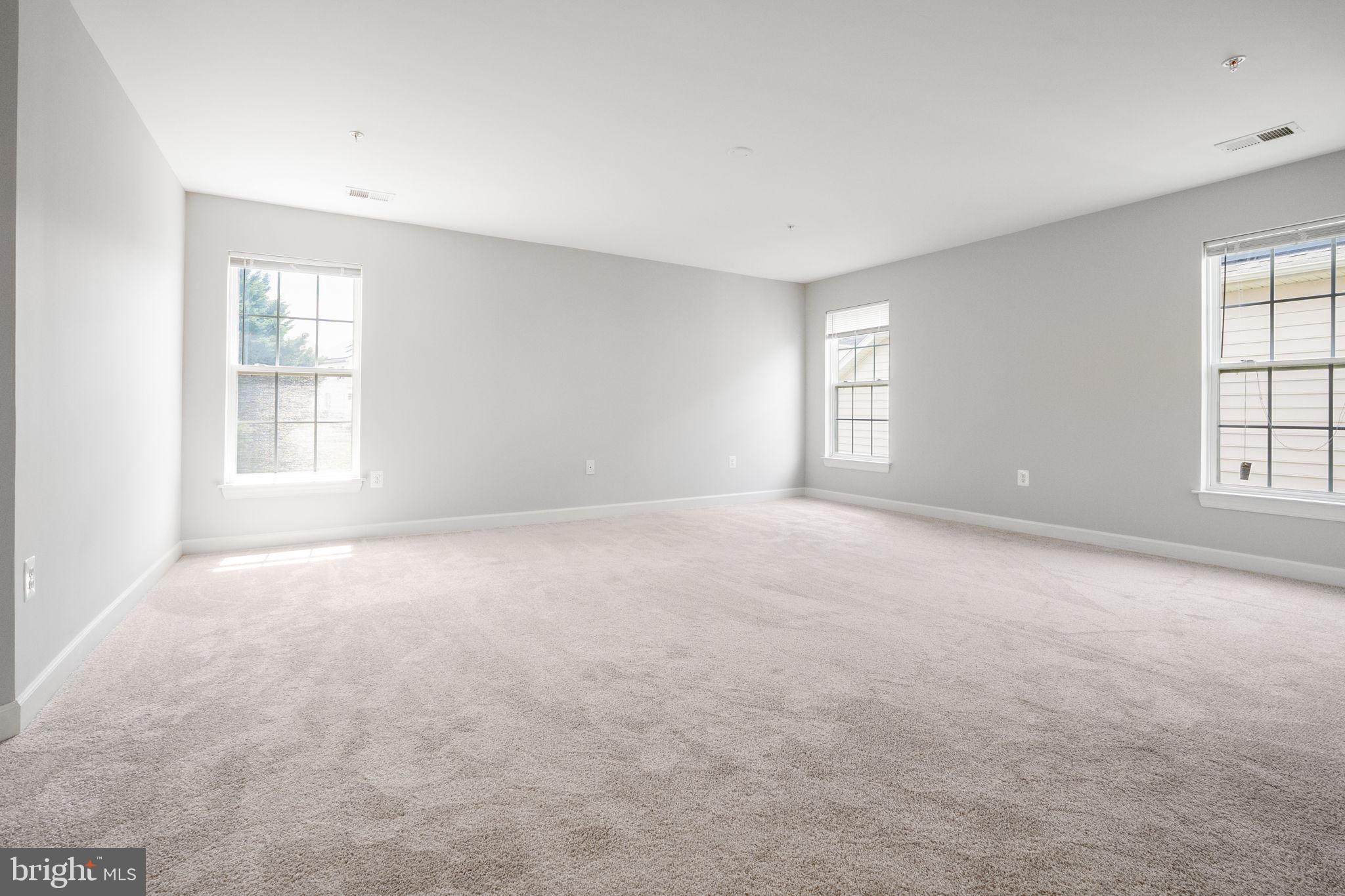 14108 Chivas Circle Laurel, MD 20707 - Photo 22 of 51 an empty room with windows