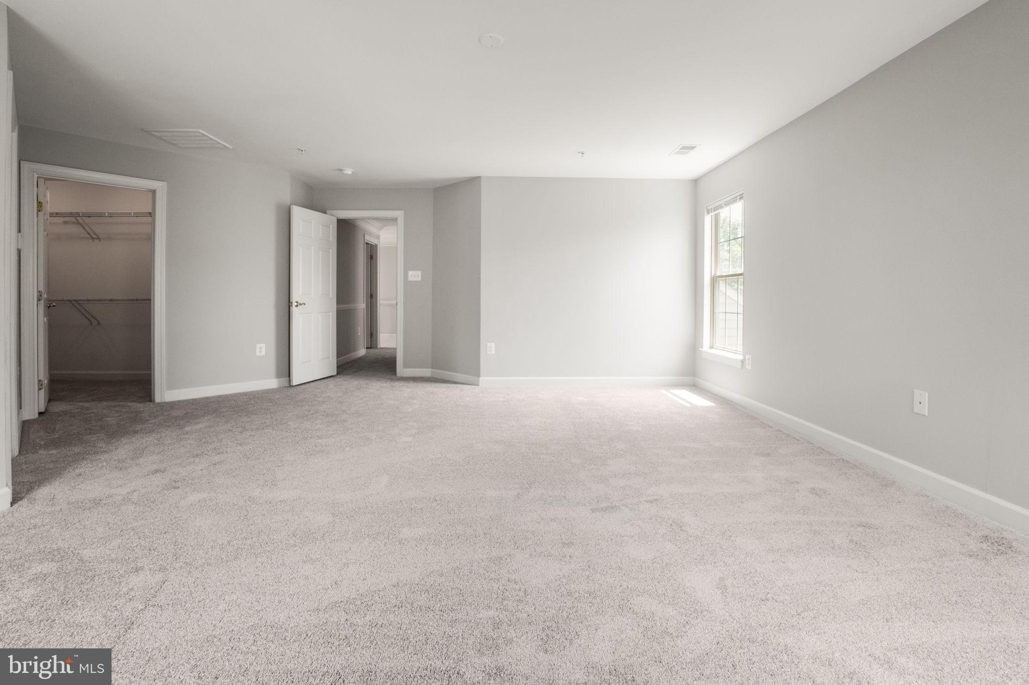 14108 Chivas Circle Laurel, MD 20707 - Photo 24 of 51 a view of an empty room with a window
