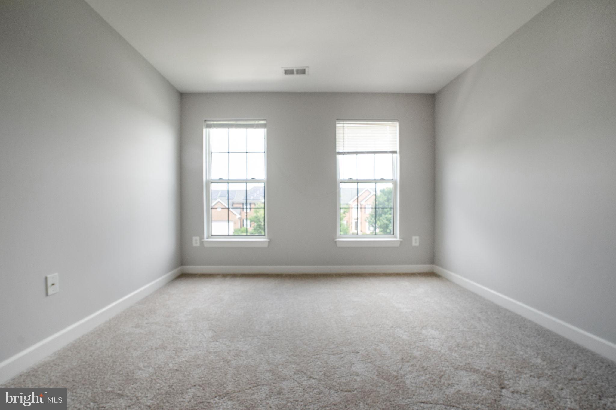 14108 Chivas Circle Laurel, MD 20707 - Photo 34 of 51 an empty room with windows