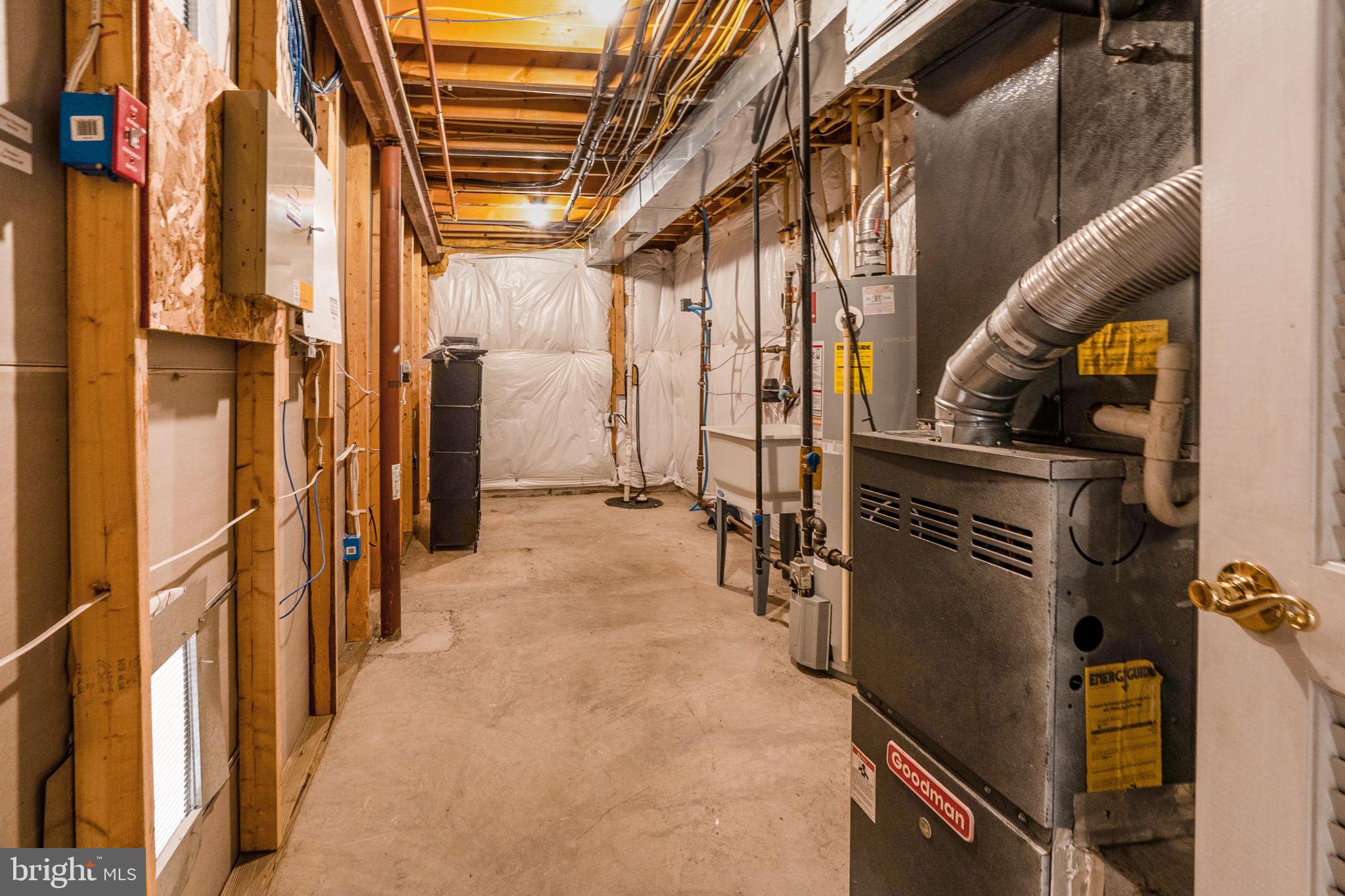 14108 Chivas Circle Laurel, MD 20707 - Photo 44 of 51 a view of walk in closet with clothes and shoes