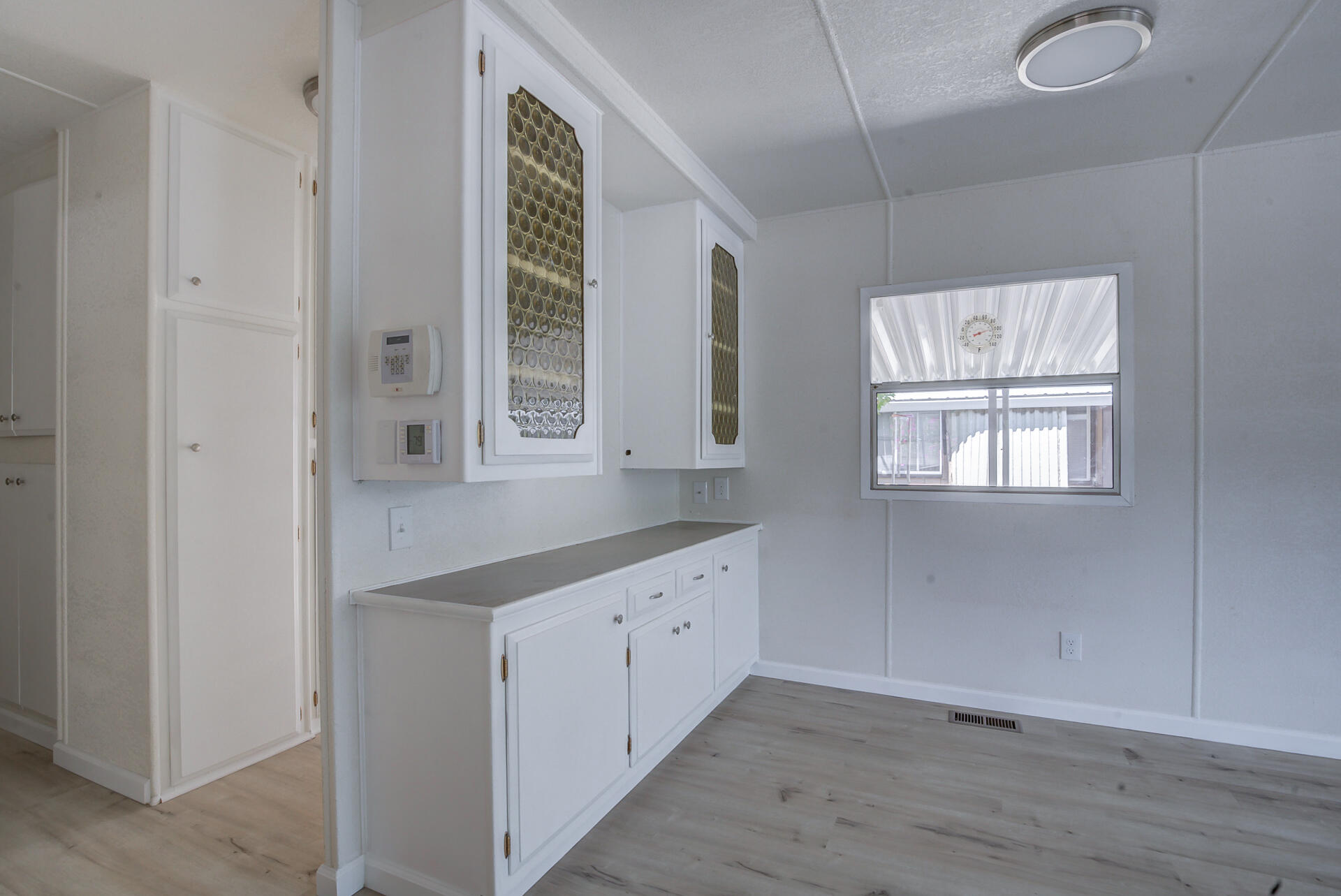 821 St Marks Street, Unit 1 Redding, CA 96003 - Photo 12 of 26 a bathroom with a sink a mirror and a window