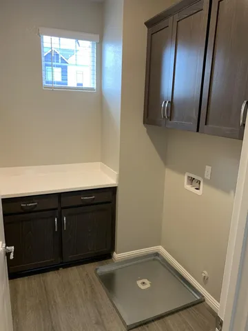 a view of an empty room with stairs