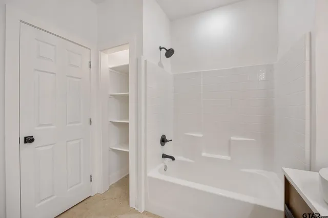 a bathroom with a bathtub
