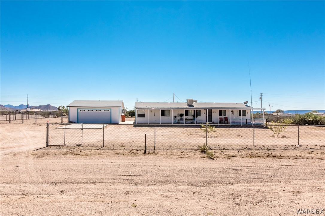 2872 McConnico Road Golden Valley, AZ 86413 - Photo 2 of 47 Front View with Fencing