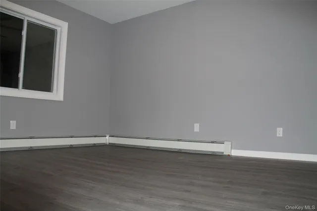 a white toilet sitting next to a sink