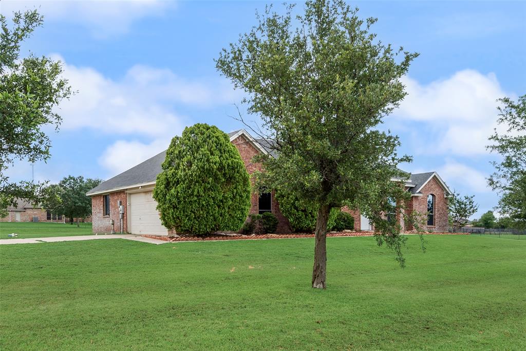 14316 Rising Spring Road Haslet, TX 76052 - Photo 4 of 31 Spacious front yard