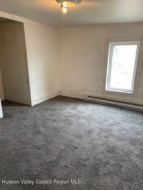676 Highway 145 Cairo, NY 12413 - Photo 16 of 25 an empty room with a window