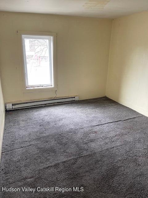 676 Highway 145 Cairo, NY 12413 - Photo 18 of 25 an empty room with a window