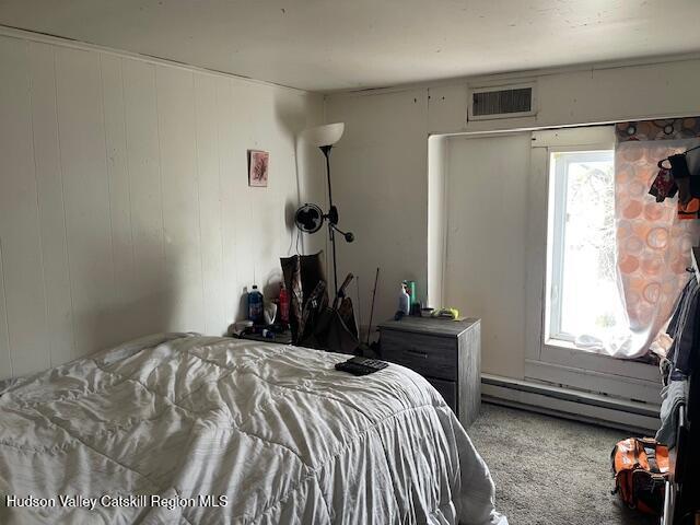 676 Highway 145 Cairo, NY 12413 - Photo 6 of 25 a bed room with a bed and a window