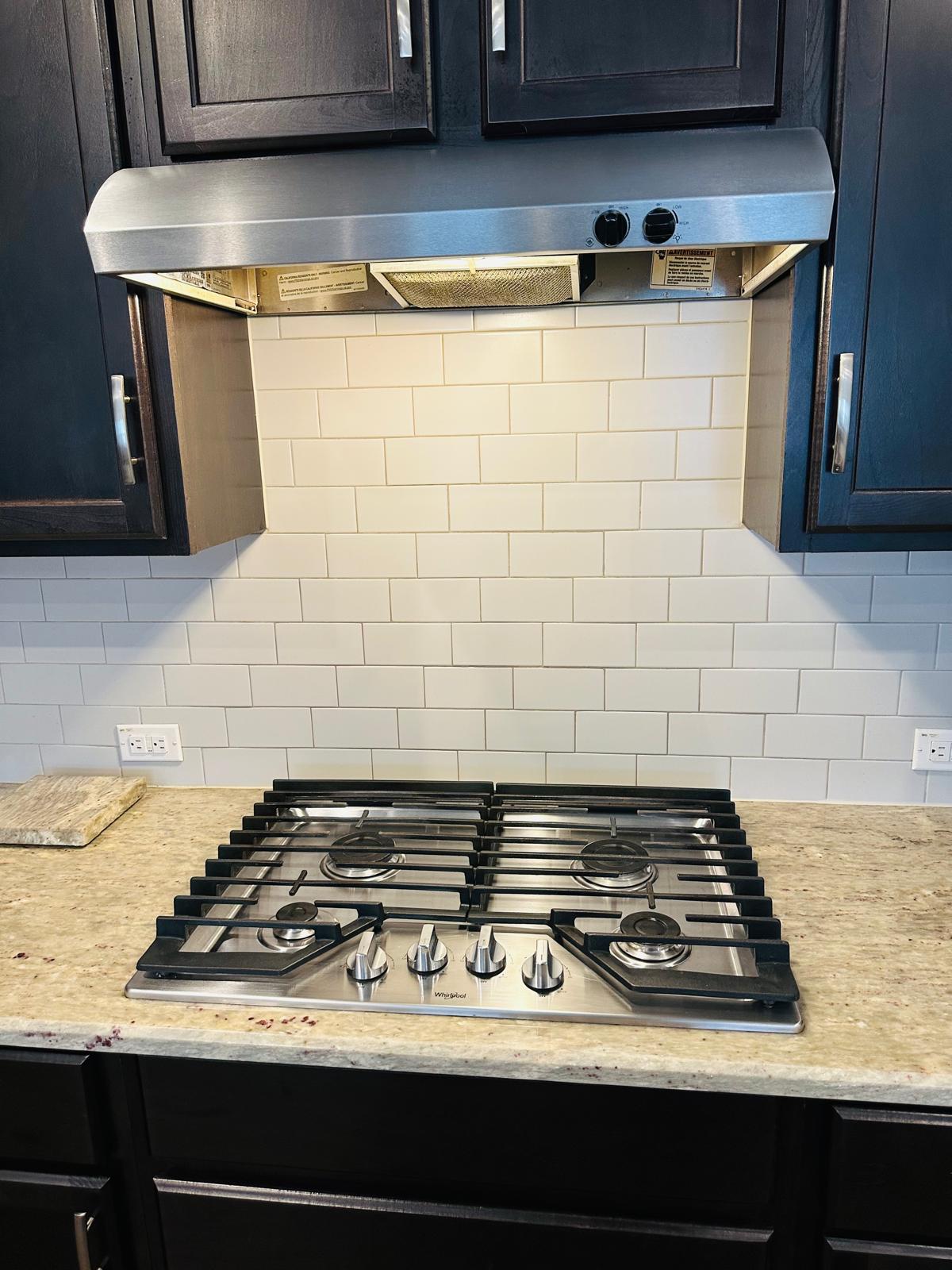 862 Leadtree Loop Buda, TX 78610 - Photo 15 of 40 a stove top oven sitting inside of a kitchen