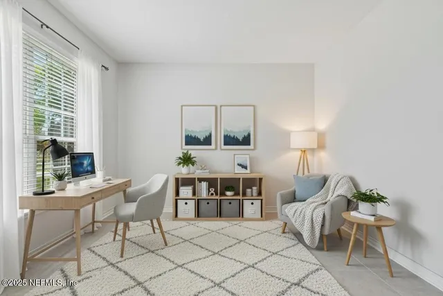 a living room with furniture and a table