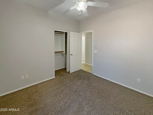 a bathroom with a double vanity sink and mirror