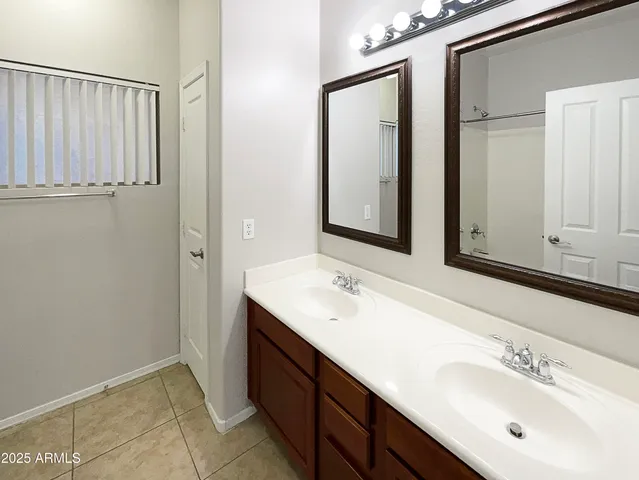 a bath room with a toilet and a bath tub