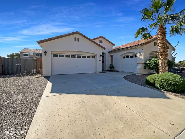 a front view of a house with a garage