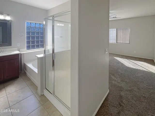 a view of walk in closet with window