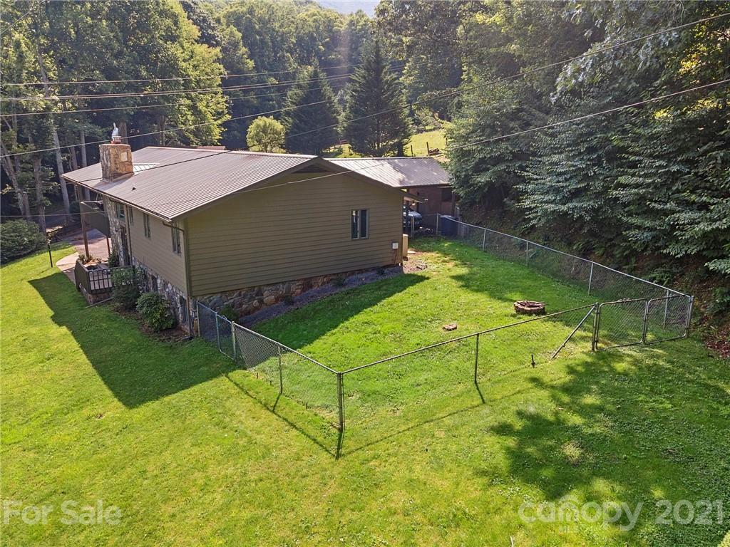 1004 Lickstone Road Waynesville, NC 28786 - Photo 35 of 39 a view of a house with pool
