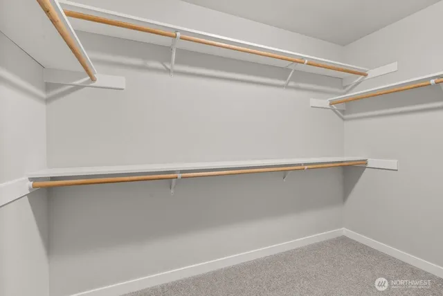 a view of a room with racks on the wall