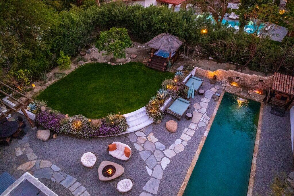 71607 Sahara Road Rancho Mirage, CA 92270 - Photo 113 of 118 an aerial view of a house with a garden and swimming pool