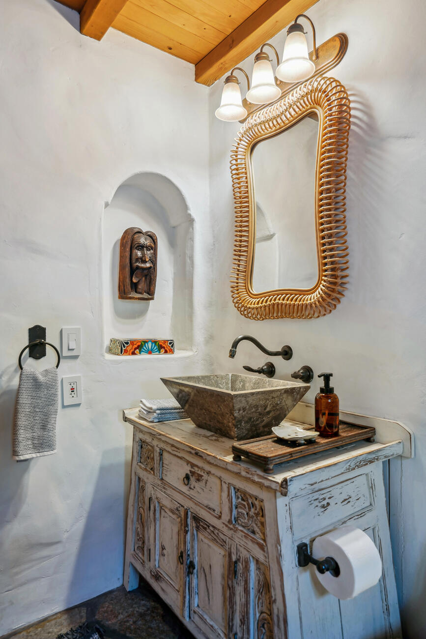 71607 Sahara Road Rancho Mirage, CA 92270 - Photo 42 of 118 a bathroom with a stove a sink and a mirror
