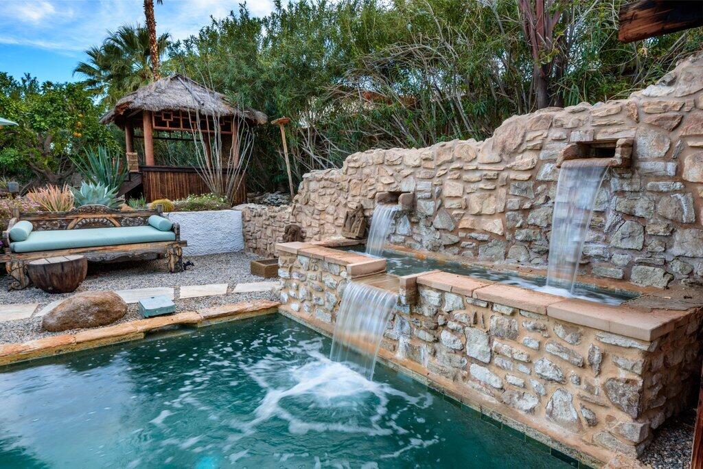 71607 Sahara Road Rancho Mirage, CA 92270 - Photo 70 of 118 a view of a house with backyard and sitting area