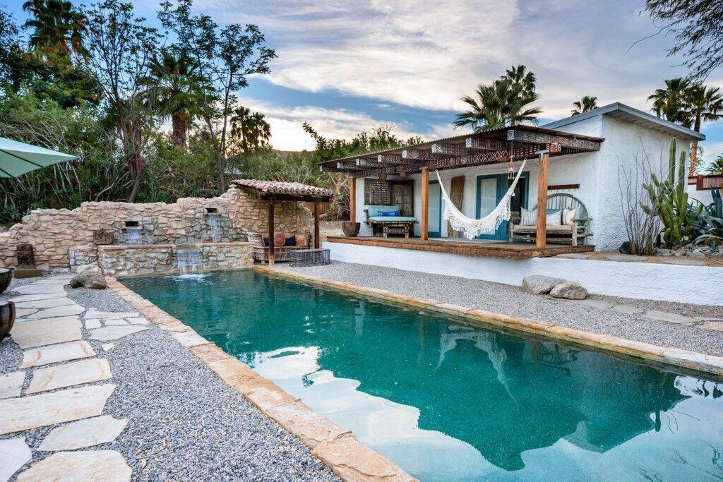 71607 Sahara Road Rancho Mirage, CA 92270 - Photo 73 of 118 a front view of a house with garden