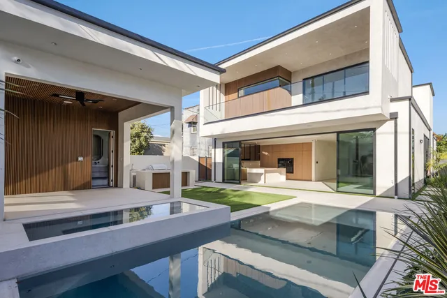 a view of living room and kitchen