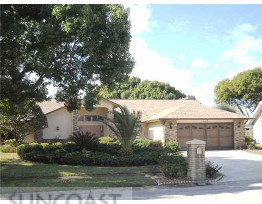 8830 Napa Loop New Port Richey, FL 34653 - Photo 1 of 1 Exterior Front - Beautifully landscaped 4/2/2