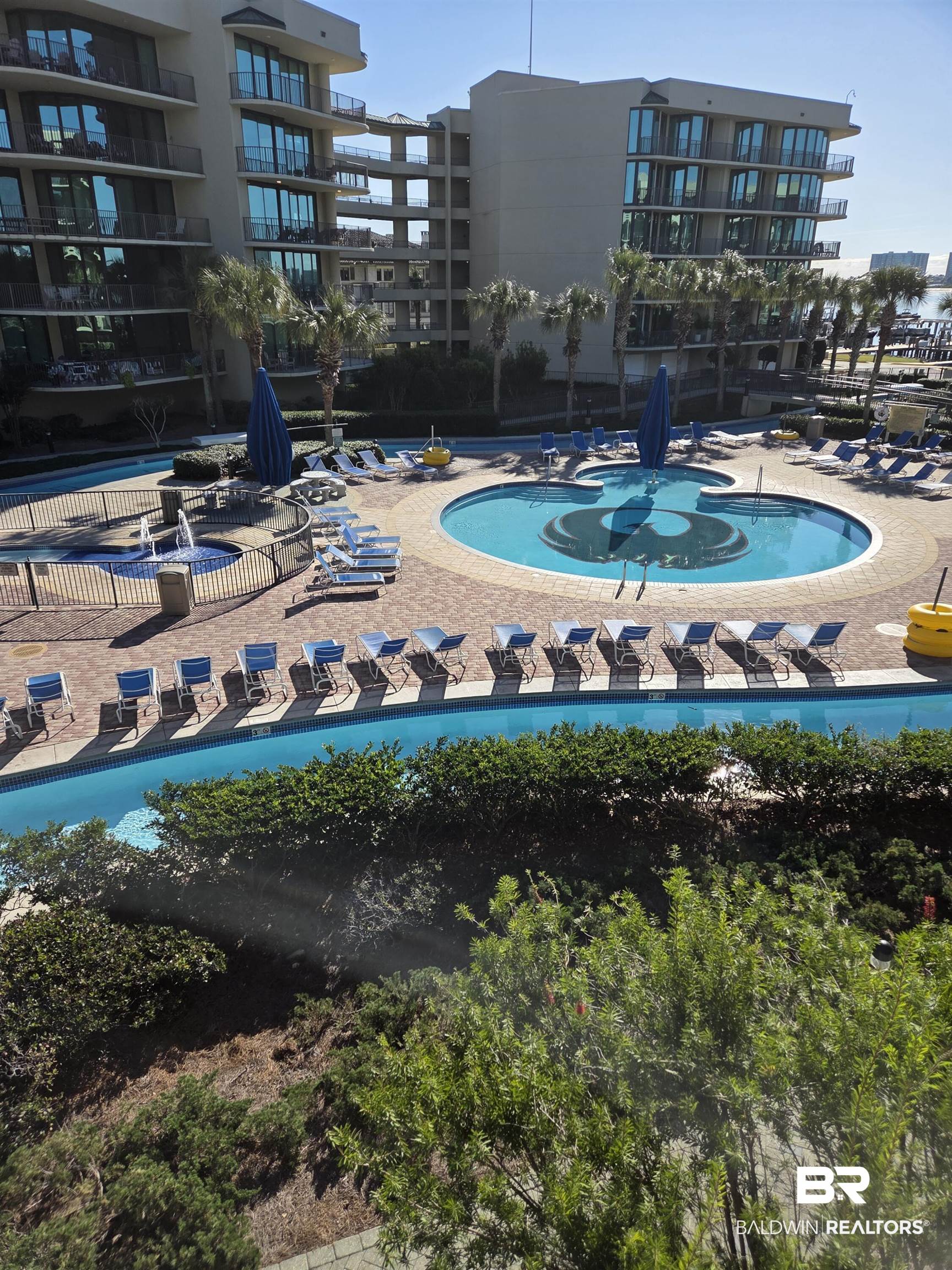 27580 Canal Road, Unit 1210 Orange Beach, AL 36561 - Photo 2 of 28 View of community featuring a pool and a patio