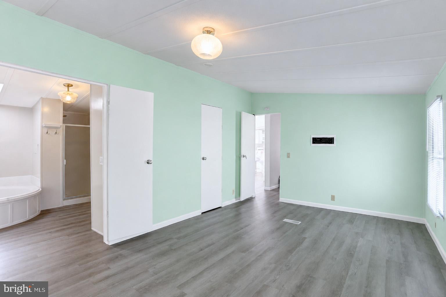 8353 Ashwood Road, Unit 8353 Jessup, MD 20794 - Photo 15 of 43 Primary Bedroom