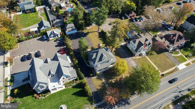 a view of a livingroom with furniture and hardwood floor