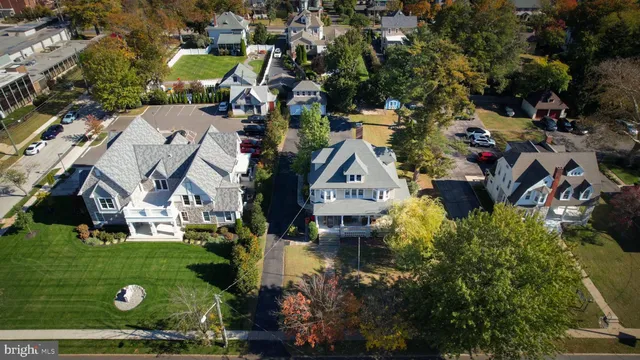 a view of an entryway with wooden floor and windows