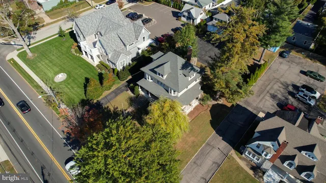a living room with furniture rug and window