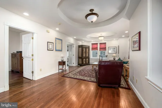 a living room with a book shelf