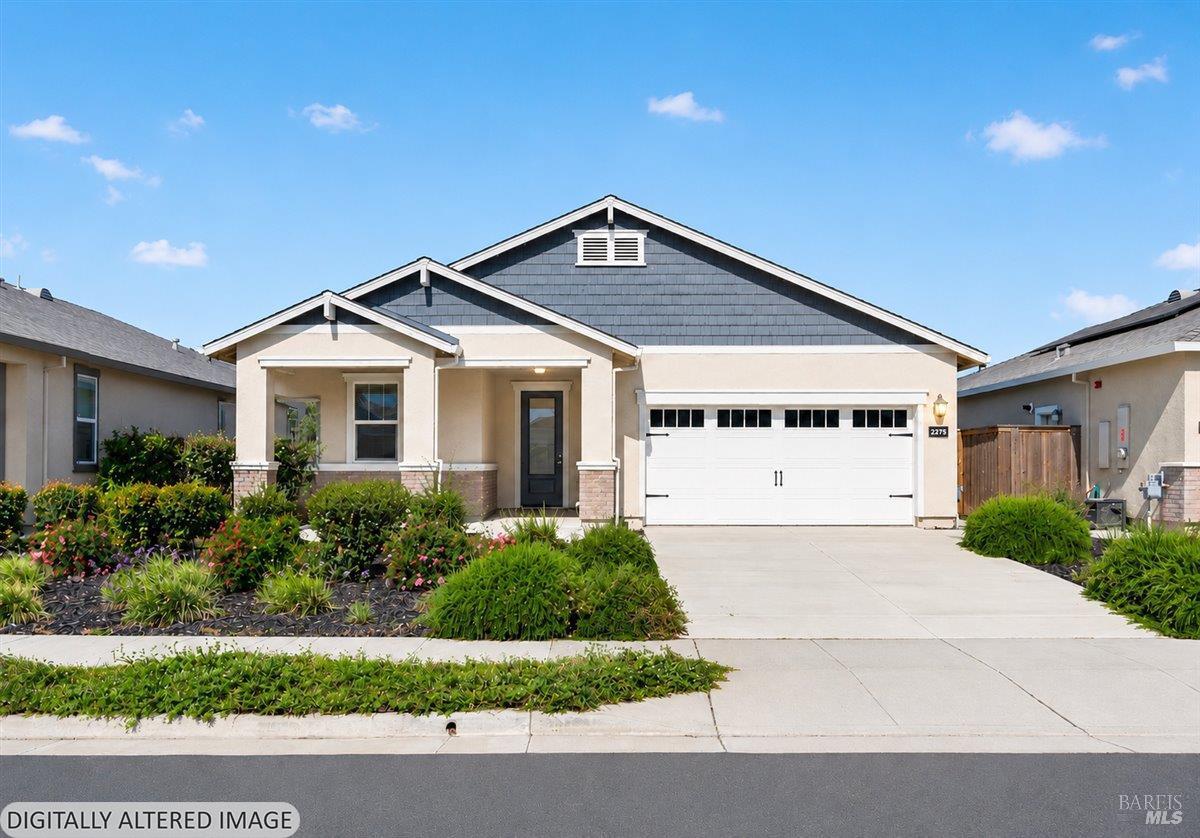 2275 Revival Lane Rio Vista, CA 94571 - Photo 22 of 31 a front view of a house with a yard and garage