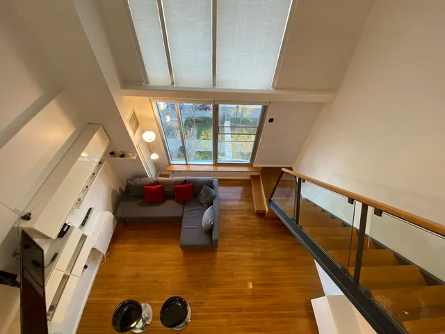 a view of entryway with furniture and rug