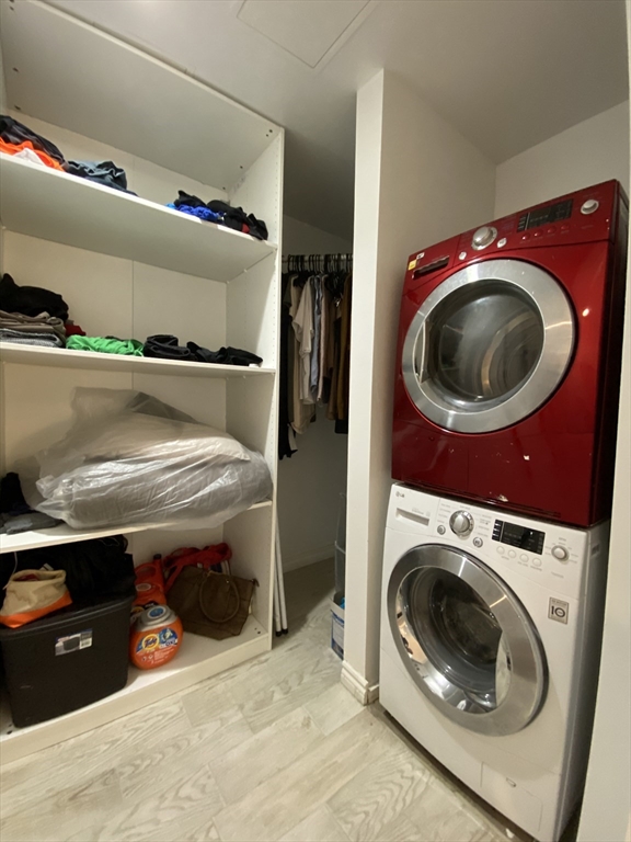 1 Earhart Street, Unit 702 Cambridge, MA 02141 - Photo 8 of 19 a utility room with dryer and washer