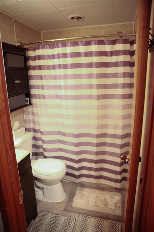 75 Spruce Peak Road Acme, PA 15610 - Photo 17 of 25 a bathroom with a sink and a toilet