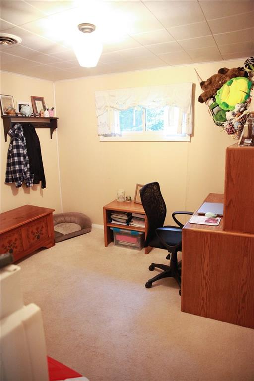 75 Spruce Peak Road Acme, PA 15610 - Photo 19 of 25 a workspace with furniture and a lamp