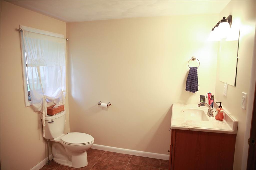 75 Spruce Peak Road Acme, PA 15610 - Photo 24 of 25 a bathroom with a sink and a mirror