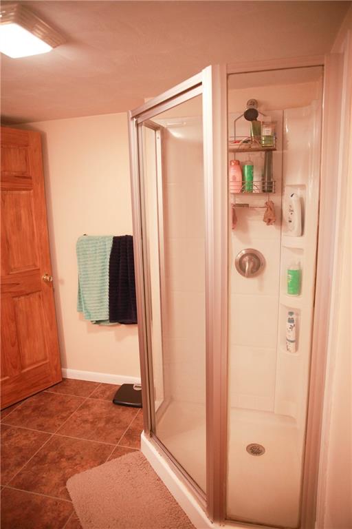 75 Spruce Peak Road Acme, PA 15610 - Photo 25 of 25 a view of walk in closet with clothes and shoes