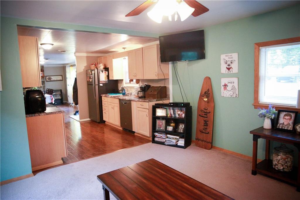 75 Spruce Peak Road Acme, PA 15610 - Photo 8 of 25 a living room with furniture and a flat screen tv