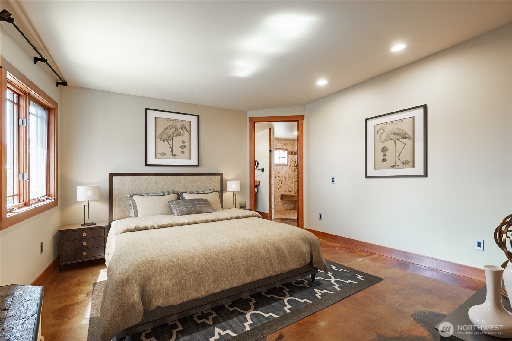 5727 Nakat Way Blaine, WA 98230 - Photo 17 of 37 a bedroom with a large bed and a window