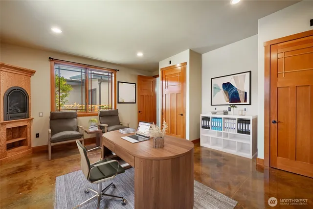 a workspace with furniture and window