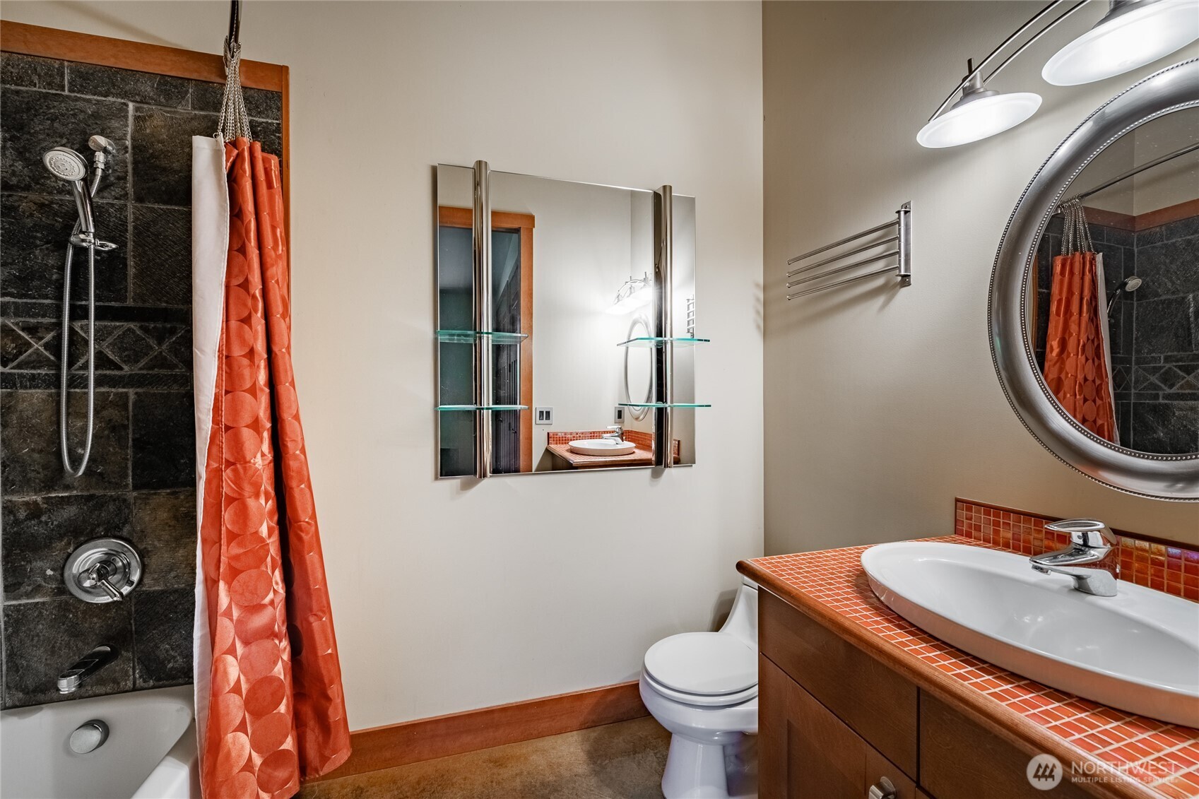 5727 Nakat Way Blaine, WA 98230 - Photo 25 of 37 a bathroom with a sink a toilet and a mirror
