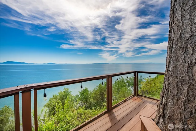a view of balcony with wooden floor
