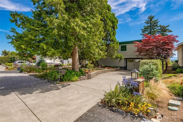 a view of a garden with patio