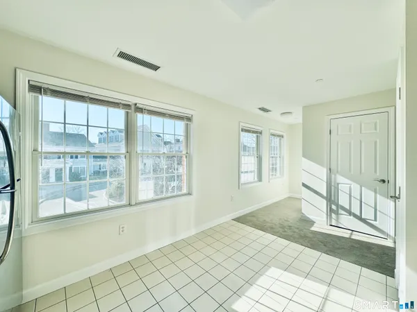 a view of an empty room with window