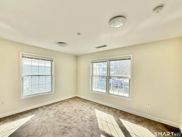 an empty room with windows